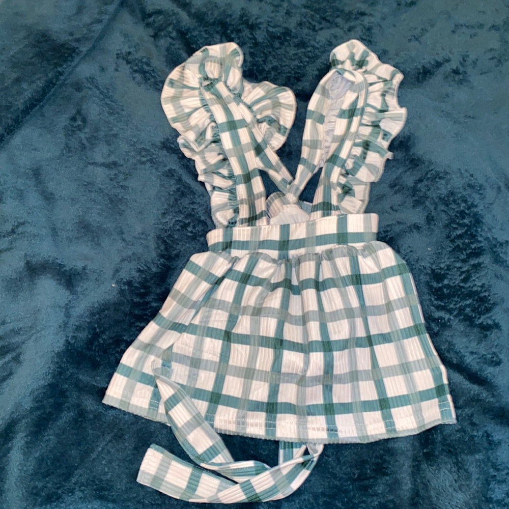 Darlin’ green and white ruffled jumper with attached snap bottoms